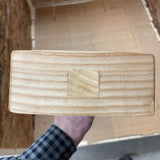view of the head of hand crafted, wooden carpenters mallet. This mallet is mad to hit your projects without leaving a mark