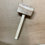 side view of hand crafted, wooden carpenters mallet. This mallet is mad to hit your projects without leaving a mark