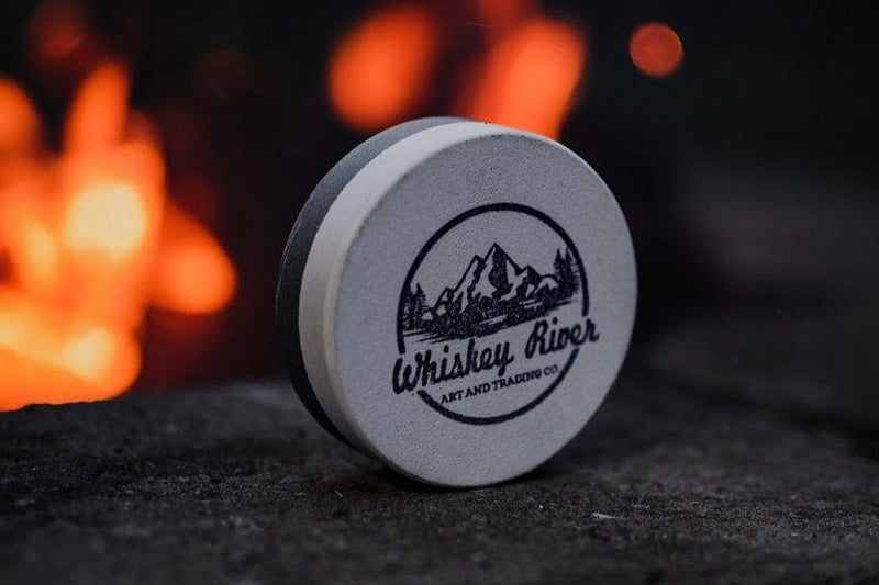 whiskey river arctic fox dual grit sharpening stone. Made in america and ready to restore the edge of your axe to a clouded mirror finish
